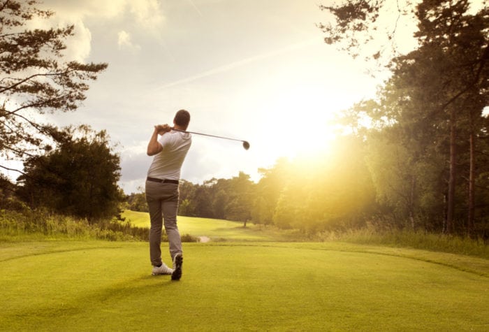 Golf player at teeoff