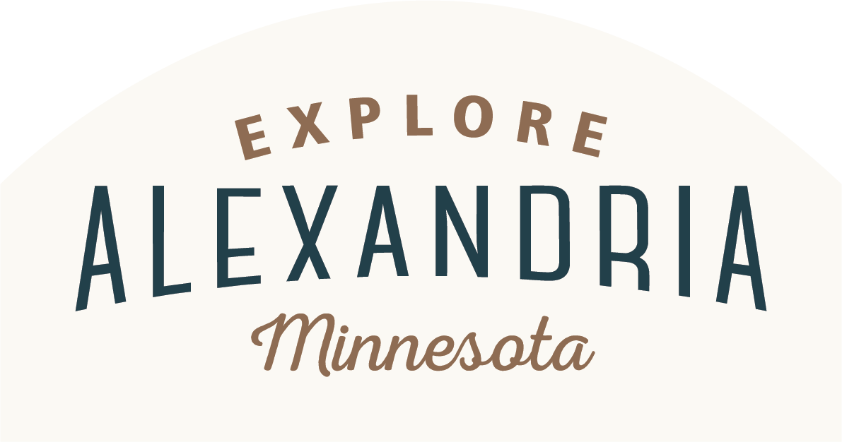 Logo with the words "Explore Alexandria Minnesota" in stylized fonts, promoting the city of Alexandria in Minnesota. The background is a light curved shape.