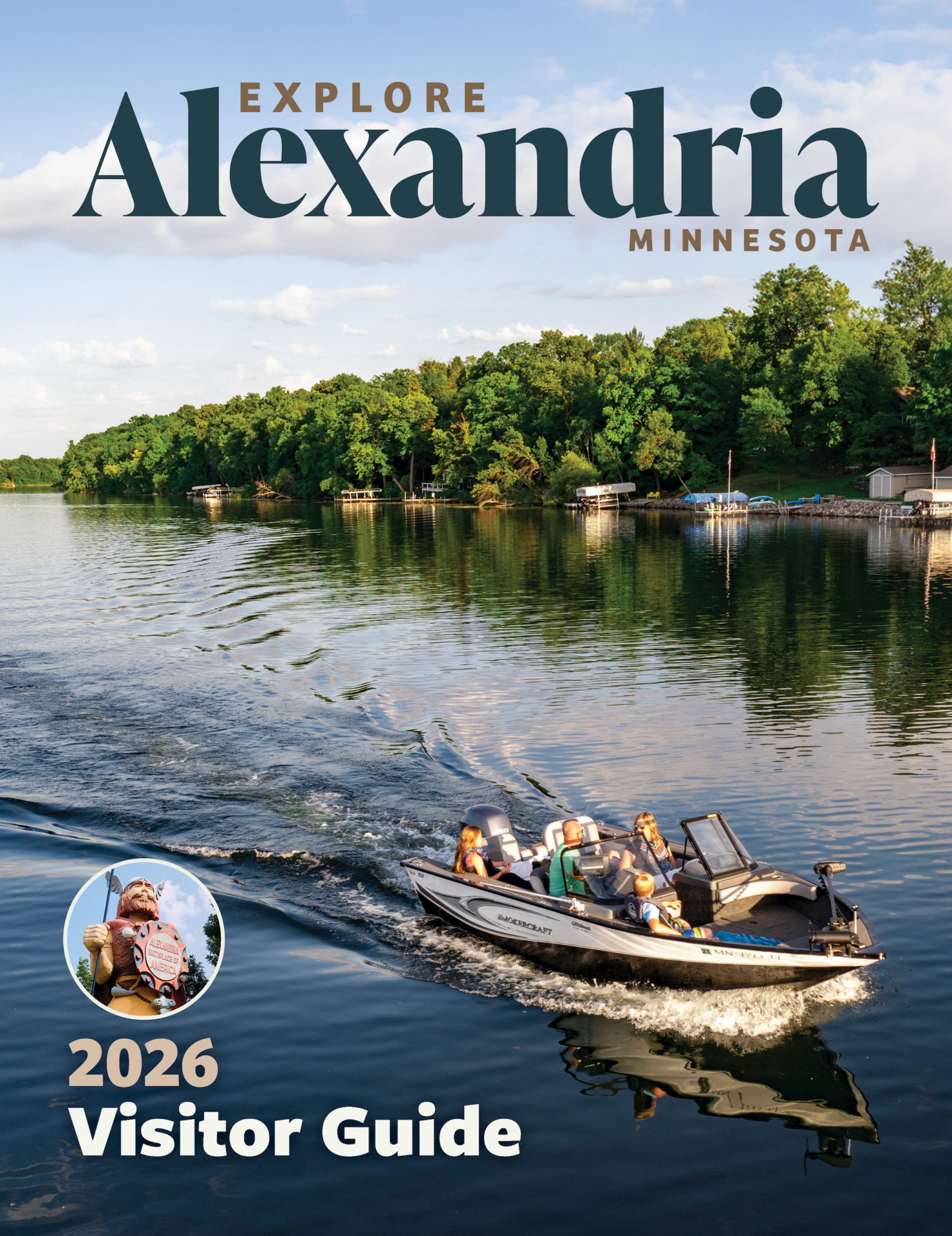 A motorboat with four people cruises on a calm lake bordered by green trees under a blue sky. Text reads "Explore Alexandria Minnesota 2026 Visitor Guide" with an inset photo of a child in a life jacket.